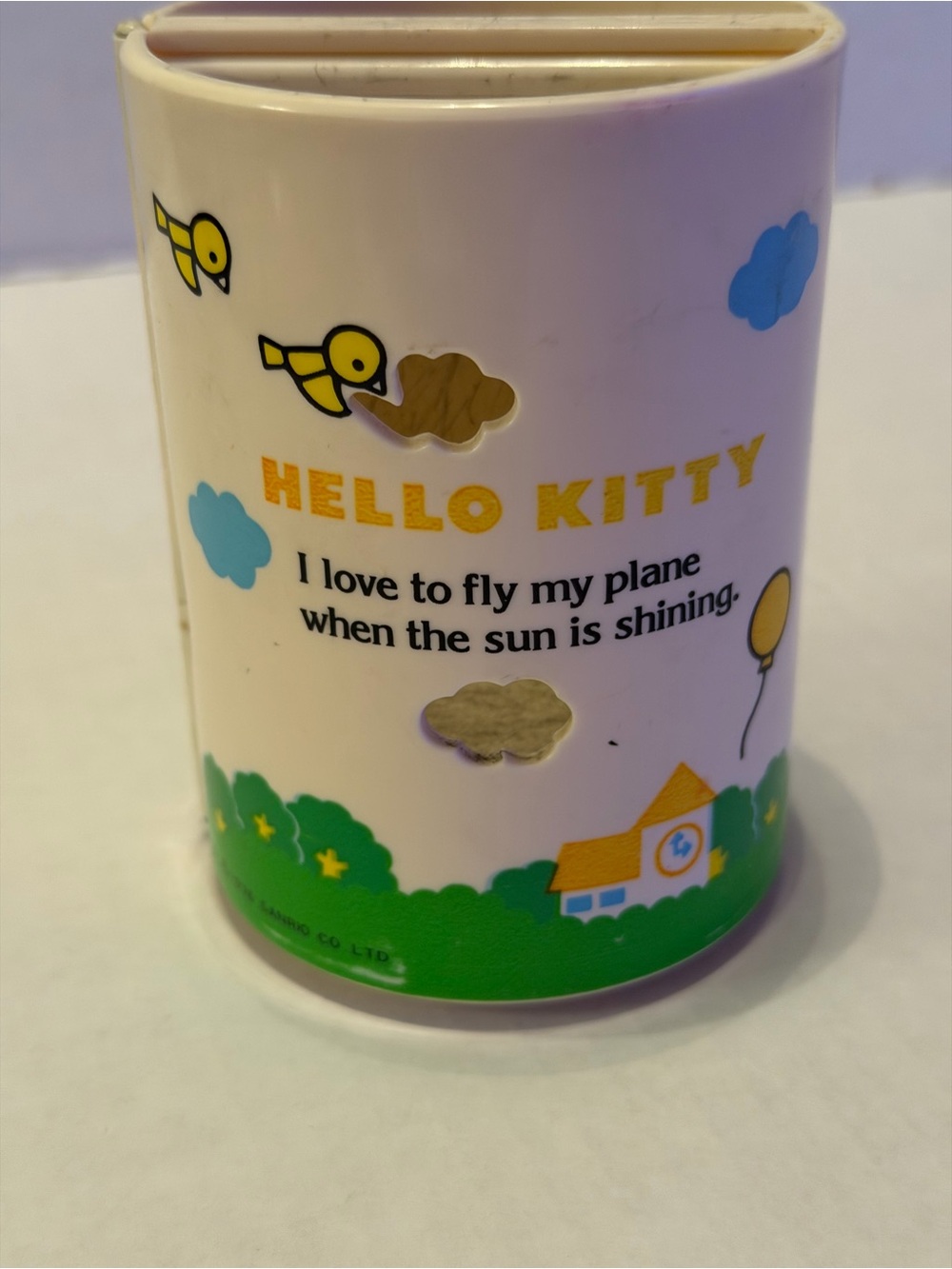 Hello Kitty White Storage Cup with Yellow, Green & Blue Accents